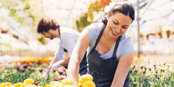 Women and man in plant nursery